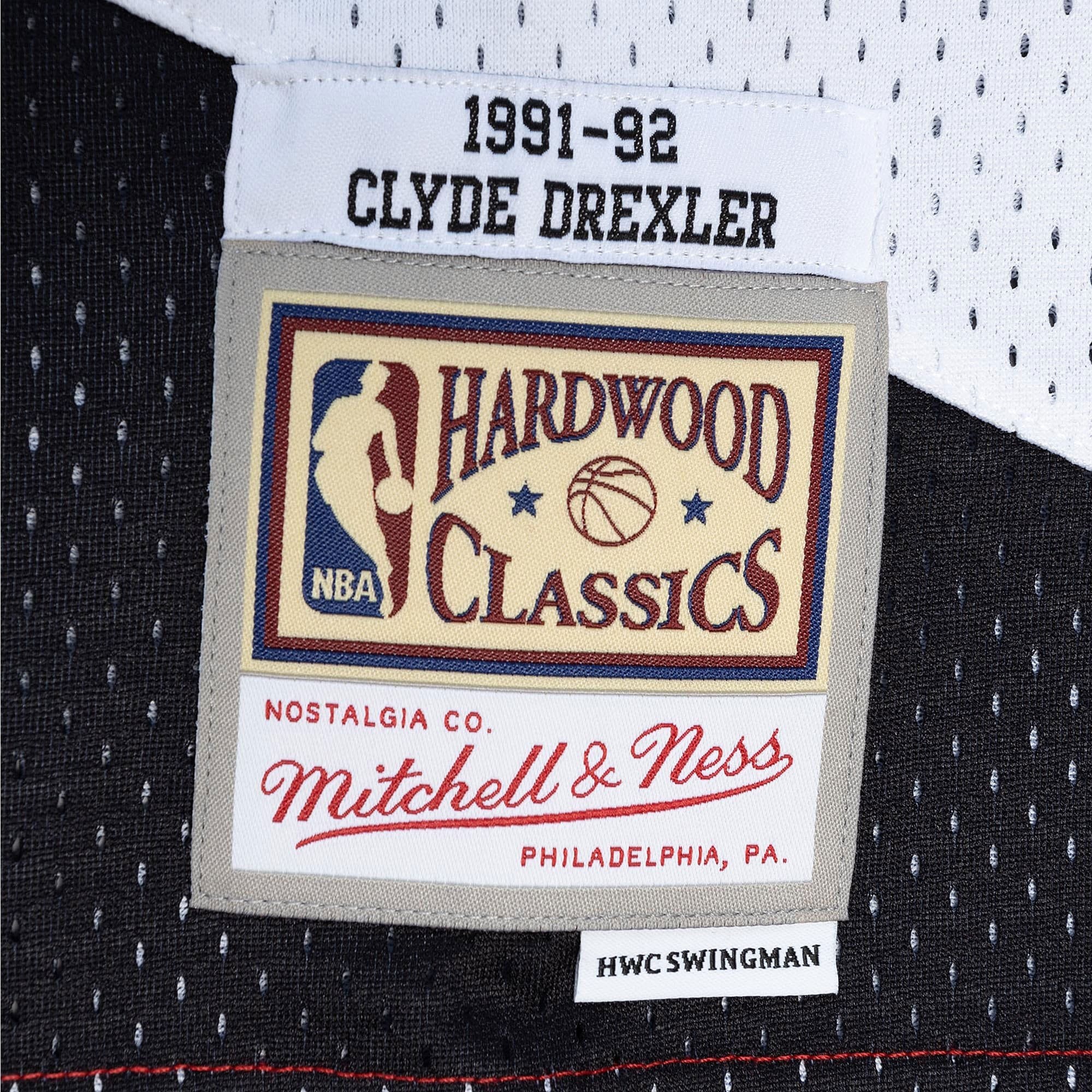 Men's Mitchell & Ness Clyde Drexler Red Black Portland Trail Blazers 1991/92 Hardwood Classics Split Swingman Jersey